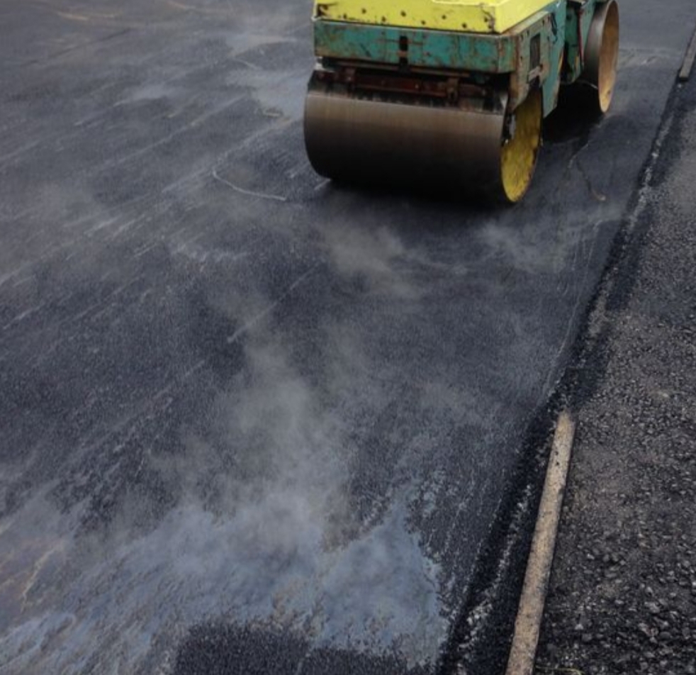 Compacting a new tarmac driveway